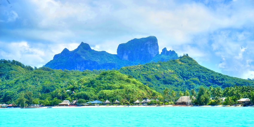 A heart-shaped atoll near Bora Bora with white sandy beaches and a stunning lagoon.