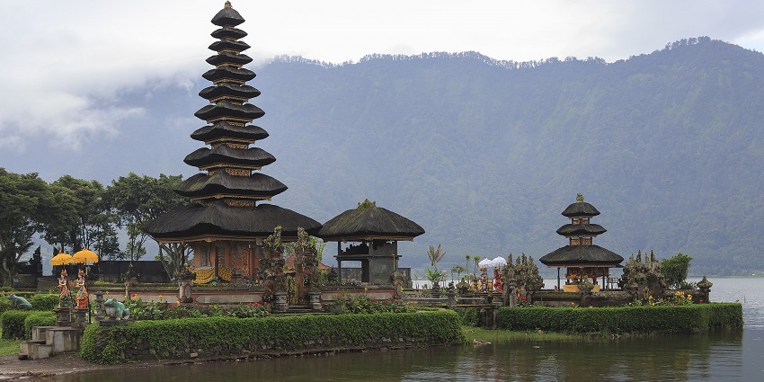 Explore the iconic floating temple with breathtaking lake and mountain views