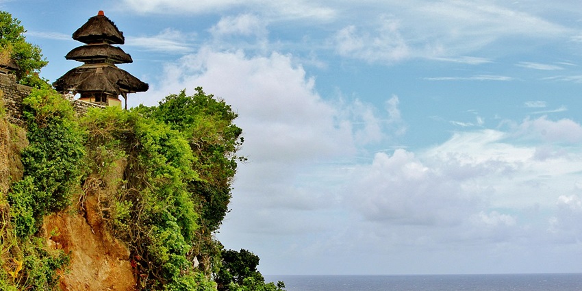 Iconic cliffside temple offering breathtaking ocean views.