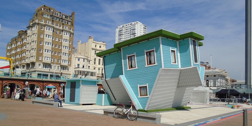An image showing a view of the Upside Down House in Brighton, a famous tourist place in the UK.