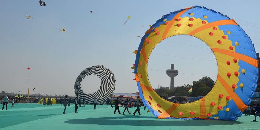 People celebrating Uttarayan, one of the cultural international festivals in India