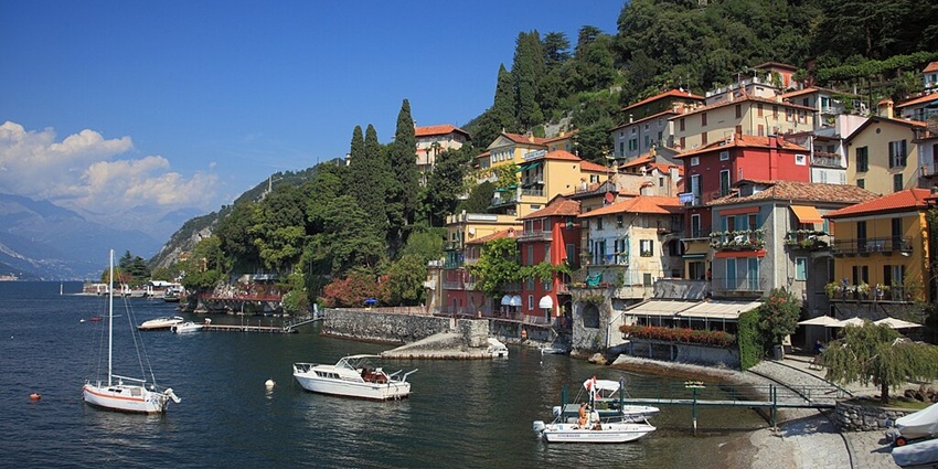 A charming lakeside village of Varenna on Lake Como, with colorful buildings by the water.
