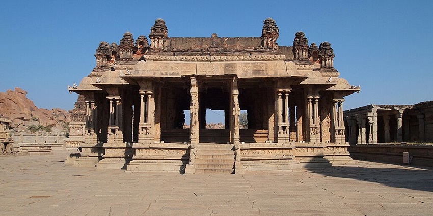 Ruins of the courtyard and the main structure of the Vijaya Vittala Temple, as described in this Hampi travel guide.