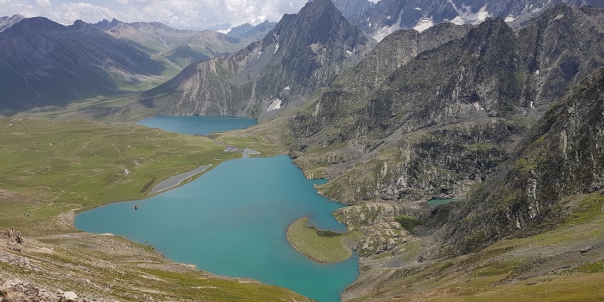 Vishansar lake with a clear water body surrounded by green shores, and Kishansar lake