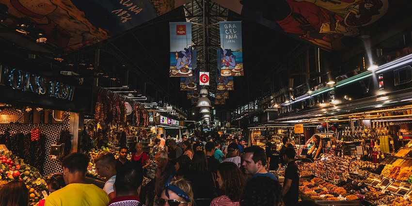 An image showing tourists strolling the bustling Otres Market.