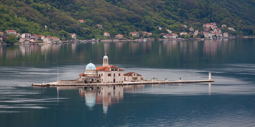Iconic island church with rich history, a place to visit as per the Montenegro travel guide.