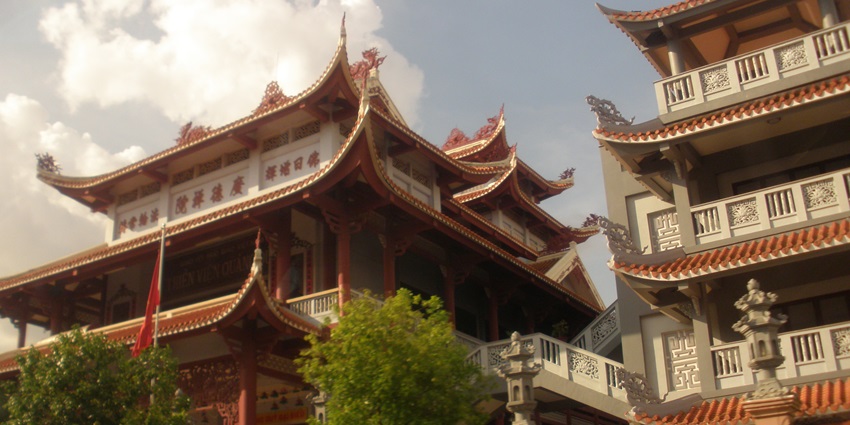 An image showing the Thien Vien Quang Duc pagoda, featuring traditional architecture.
