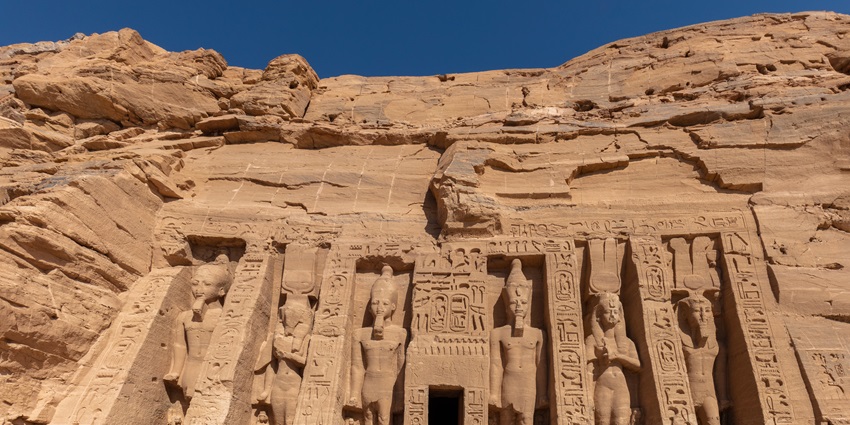An image of the Temple of Nefertari in Abu Simbel, Egypt, showcasing its grand statues and intricate carvings.