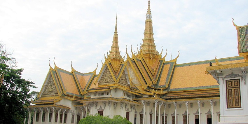 An image of the Royal Palace including gardens and tombs in pagoda, Phnom Penh, Cambodia.