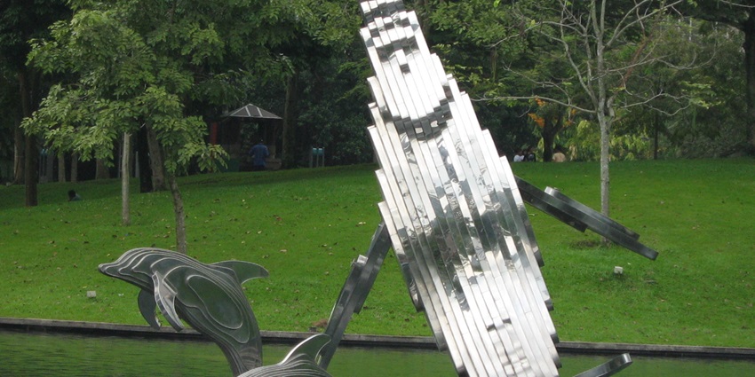 A steel whale and dolphin sculpture in KLCC Park, near Petronas Twin Towers, Kuala Lumpur