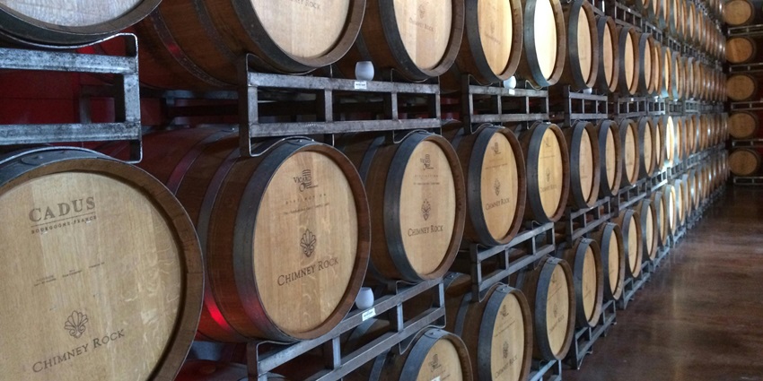 A historic French wine cellar at Ba Na Hills showcasing vintage barrels and rustic charm.