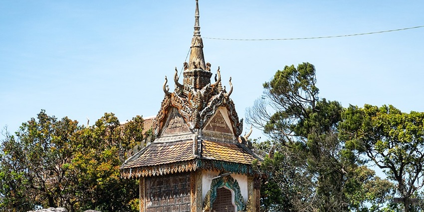An image showing a view of Wat Sampov Pram, a popular place in Kampot, Cambodia.