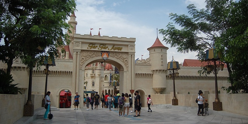 An image of the Far Far Away castle entrance, with guests exploring fairy tale land