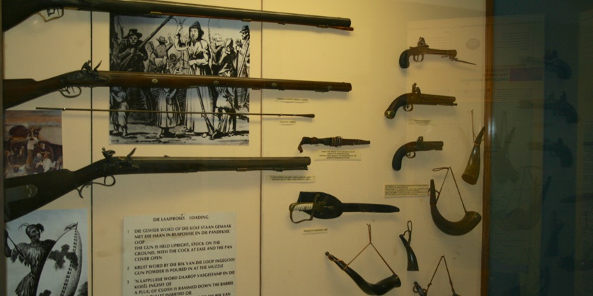 An image showing a gun display at Monument Museum, near Voortrekker Monument.