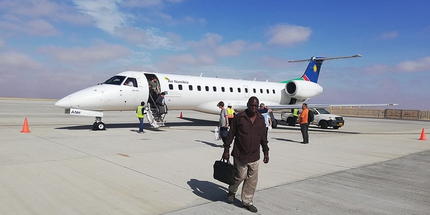 An Air Namibia aircraft is disembarking passengers at Walvis Bay Airport presently.