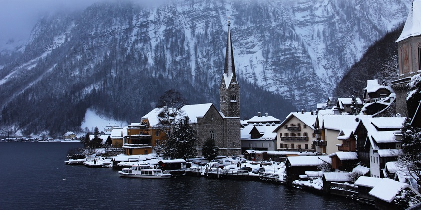 A village with mountains in the background highlights things to do around Hallstatt in winter