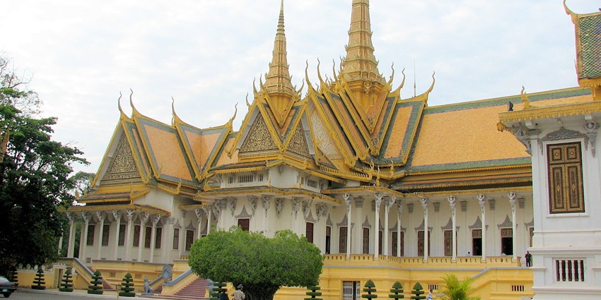 An image of Royal Palace including gardens and tombs in pagoda, Phnom Penh Cambodia.