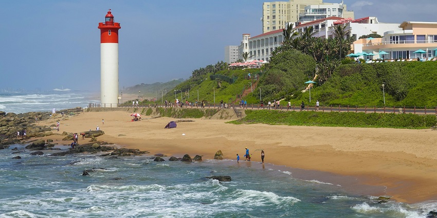 Surfers are catching waves at Warner Beach, a great place for adventure during December.