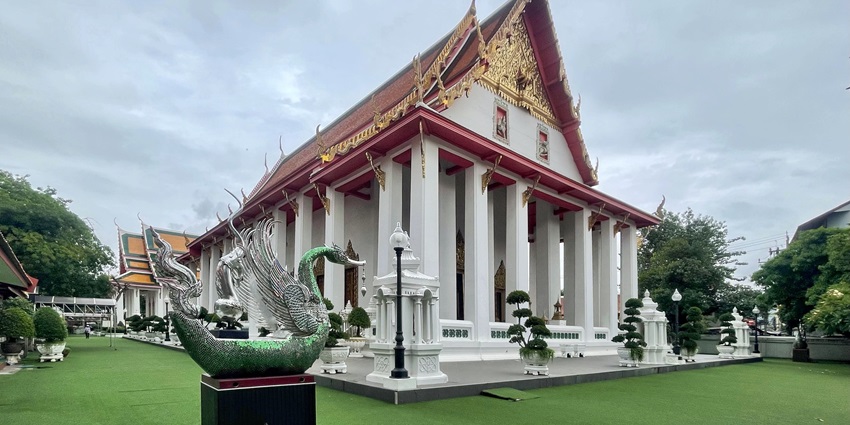 Experience the spiritual ambiance and intricate architecture of Wat Hong Rattanaram