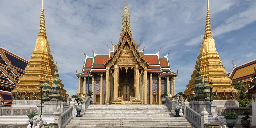 Alt-Text: A detailed view of the Temple of the Emerald Buddha, showcasing its intricate architecture.