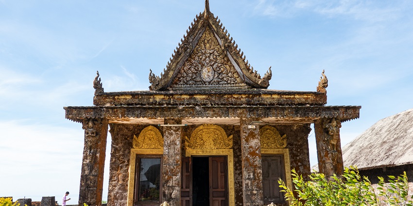 An image showing Wat Sampov Pram on Bokor Hill, with its historic structures and landscape.