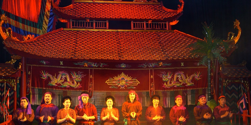 Image of the water puppet show in Vietnam, witnessing this is one of the things to do in Hanoi