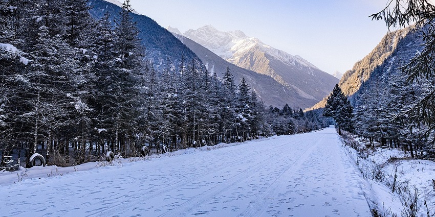 Towering peaks, Tibetan culture, lush valleys, and diverse wildlife of West Sichuan.