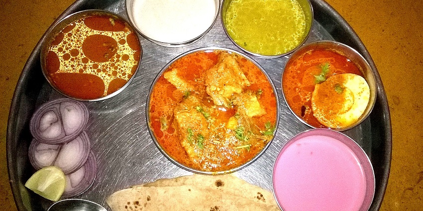 A picture of the mouth-watering thalis you will be served near Crater Lake in India.