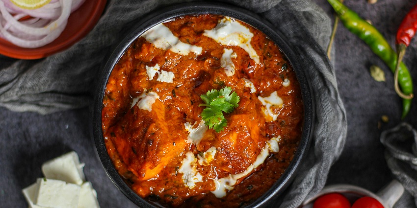 Savour the tasty dishes made with Himalayan spices near the temple in Uttarakhand.