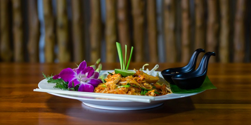 Dine near this waterfall with authentic Balinese cuisine and scenic tropical views
