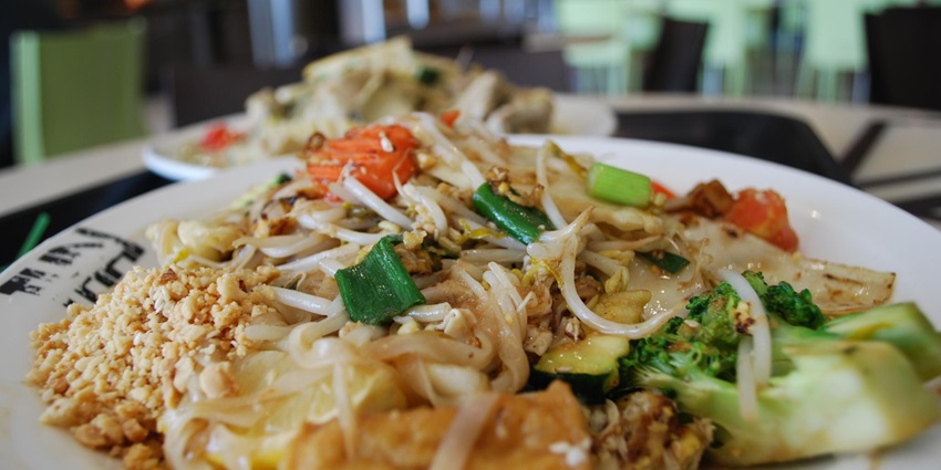 Enjoy authentic Thai cuisine near the temple, from Pad Thai to international dishes