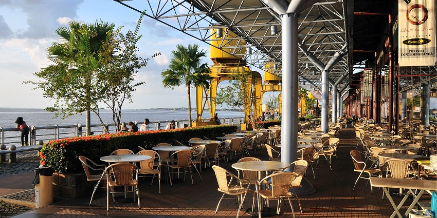 Dine at various restaurants while enjoying a stunning view in the background.