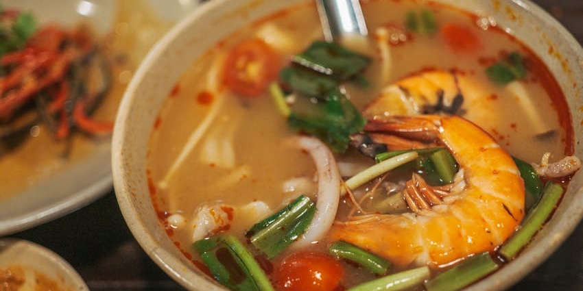 Kuramathi Island offers diverse dining, from seafood to Thai, Mediterranean, and beachside barbecues.