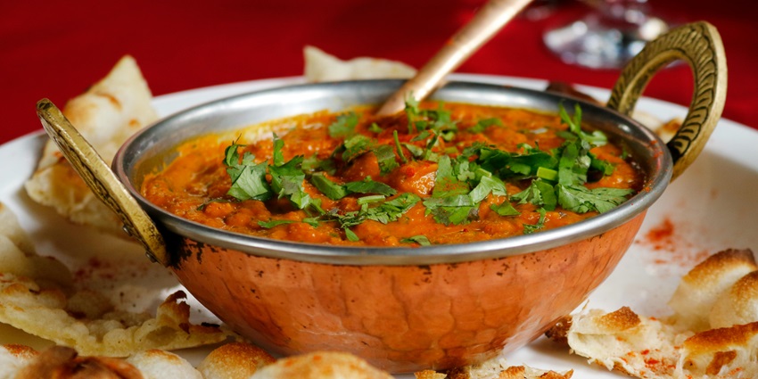 A traditional Sri Lankan dish spread at a local restaurant for travellers to taste.