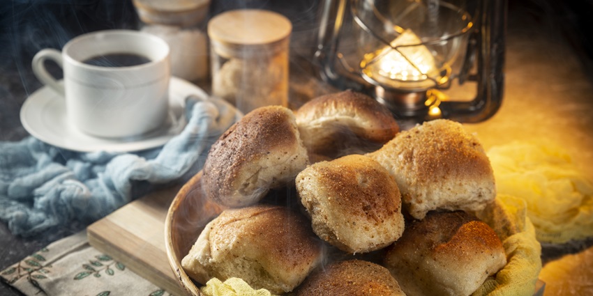 Freshly baked pandesal bread and coffee served at a local restaurant near Karura Forest
