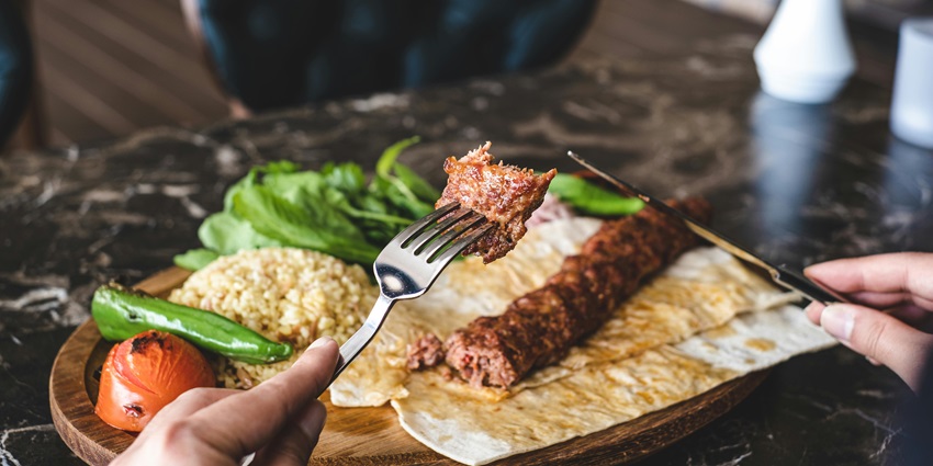 A picture of a traditional Turkish meal served at a riverside restaurant near Aspendos.