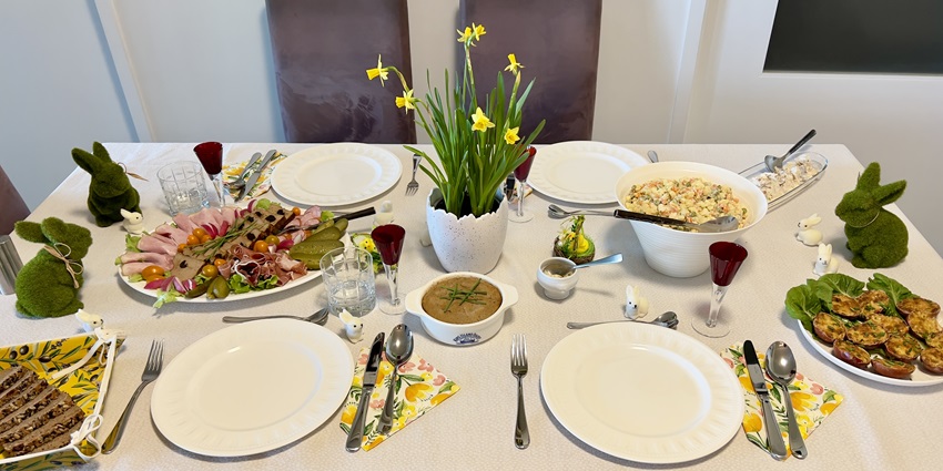 Image of a traditional Polish Easter meal in Brisbane, Australia, showcasing a variety of festive dishes.