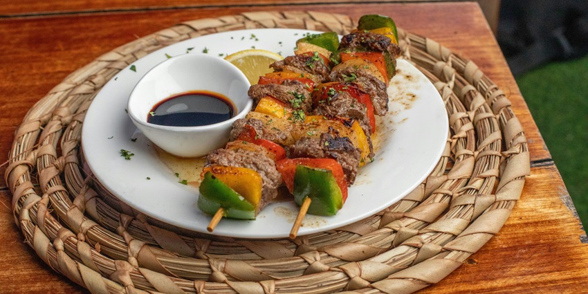 View of a plate of delicious food served at the local restaurants near the waterfalls