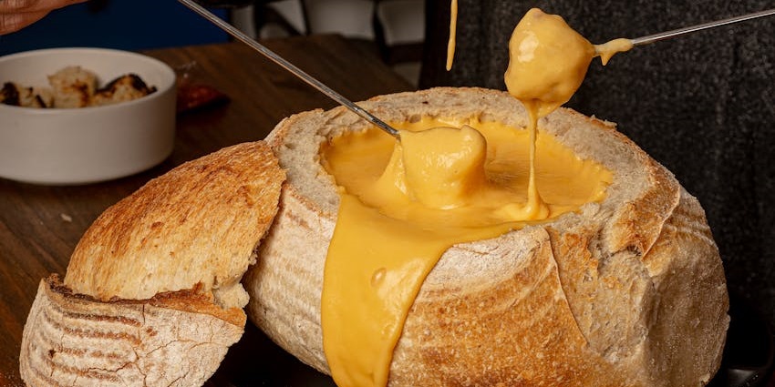 Cheese fondue is a beloved dish in restaurants here, offering a warm, flavourful experience.