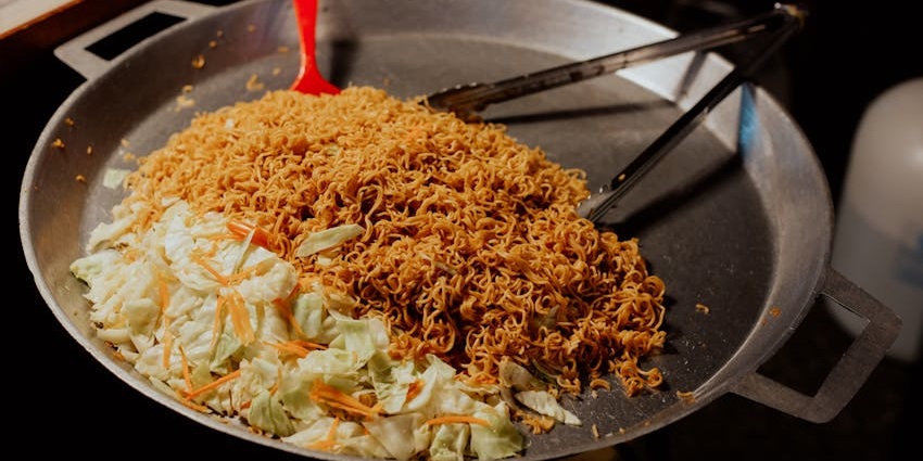 An image showing fried noodles at a restaurant near the Rose Hill Mauritius.