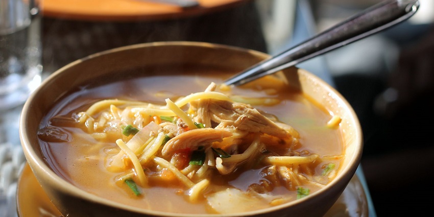 Tibetan-style thukpa noodles soup with different vegetables served in a bowl