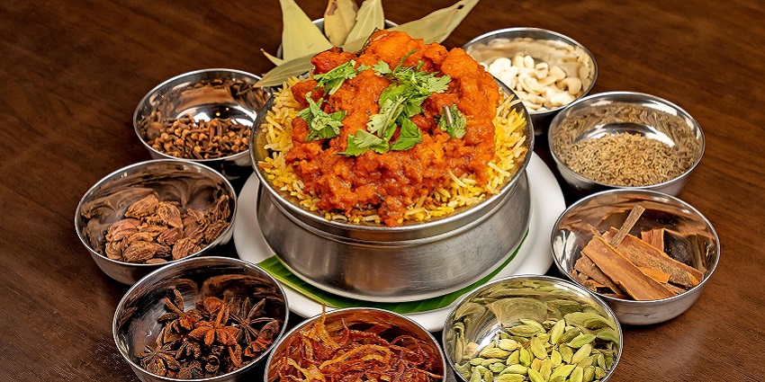 An image of a plate full of food similar to food in restaurants near Shirpur Water Park.