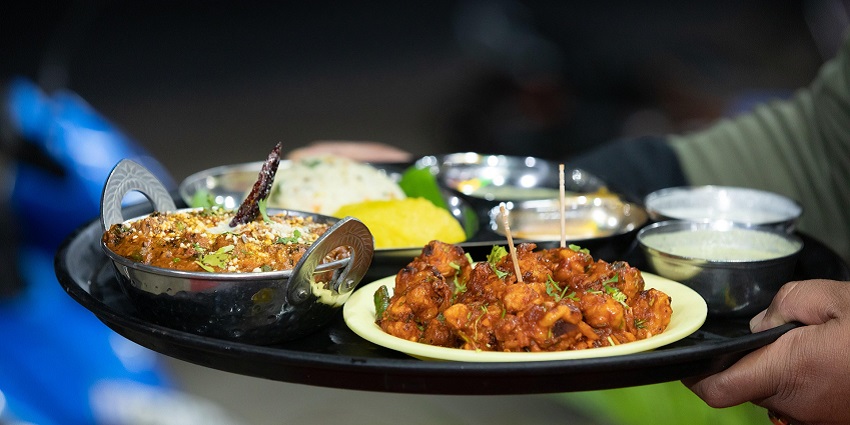 A delicious spread of Maharashtrian food served at a restaurant near the park.
