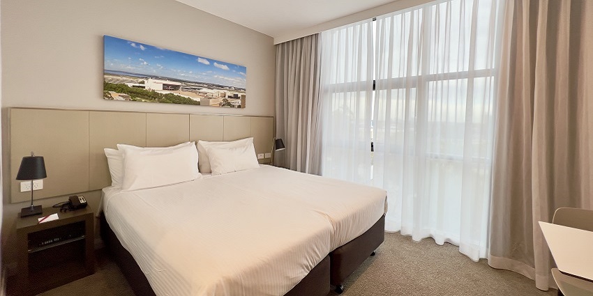 A scenic view of a beautiful hotel room in Nagaland, with decent amenities.