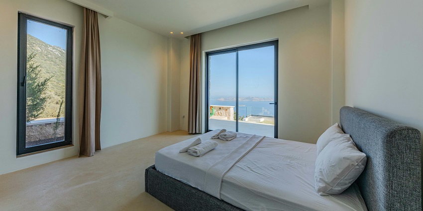 Image of a hotel room with clean sheets a bed and window with scenic view - perfect for every traveller
