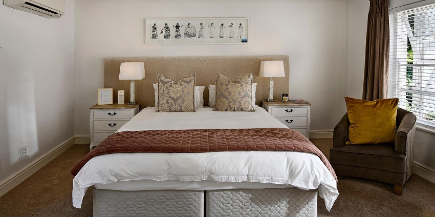 A luxurious beachfront hotel near Noordhoek Beach in South Africa with ocean views.