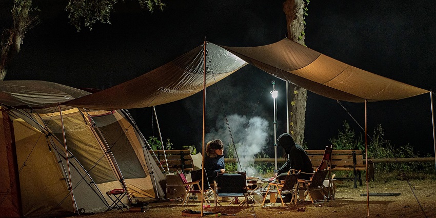 Traditional Bhutanese tents set up at a high altitude reflect the camping culture inherent in Bhutan treks.