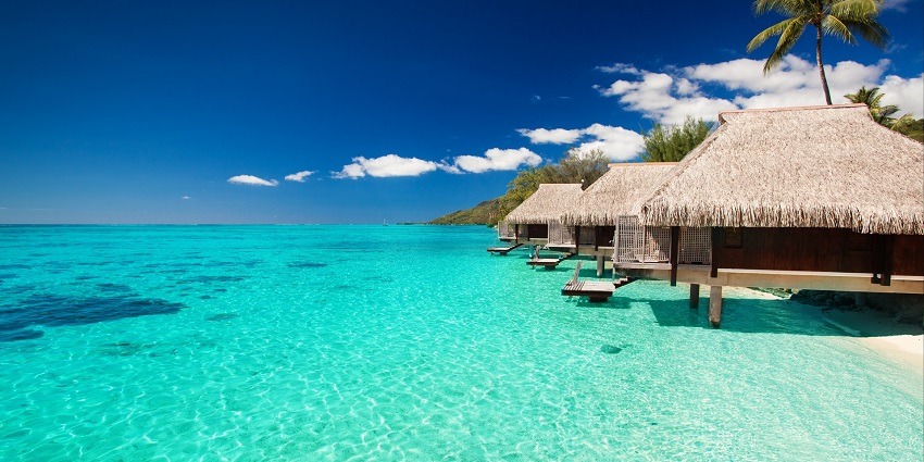 Affordable accommodations, according to the Thulusdhoo Island travel guide, has ocean views, modern amenities, and beach access.