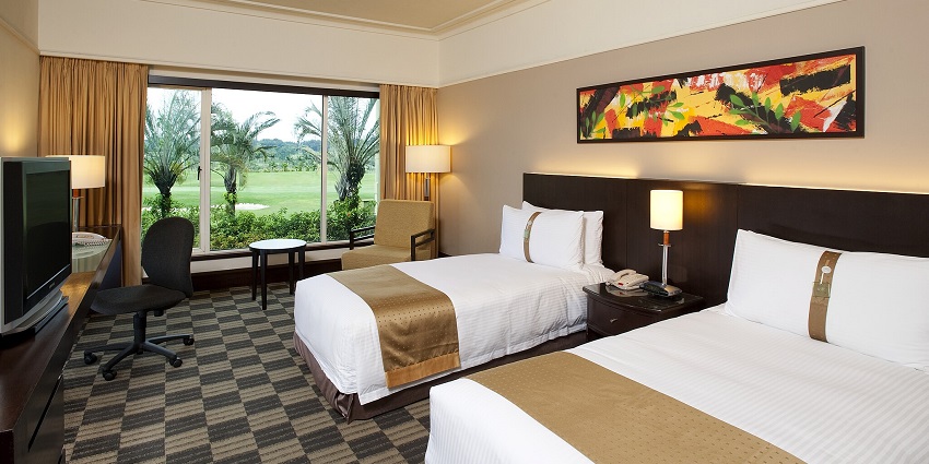 A view of the luxurious hotel rooms provided with beds at a hotel in the Great Rift Valley