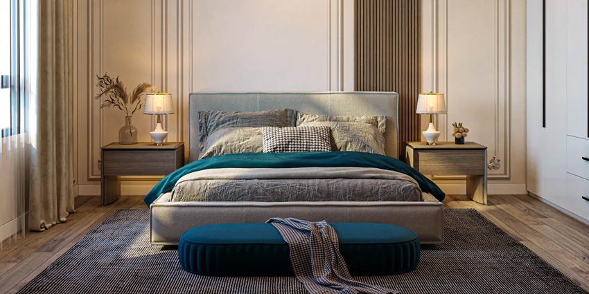 An image showing a bedroom with a large bed, a window, and luxury furnishings with a cosy setting.